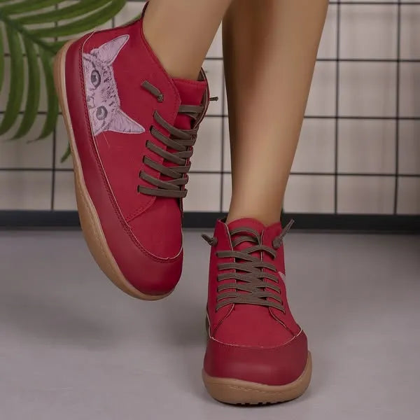 Zorelle - Botines con detalle de gato