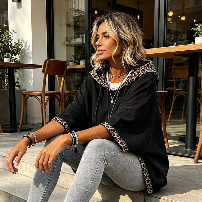 Aliz - Sudadera con capucha, mangas murciélago y ribete de leopardo