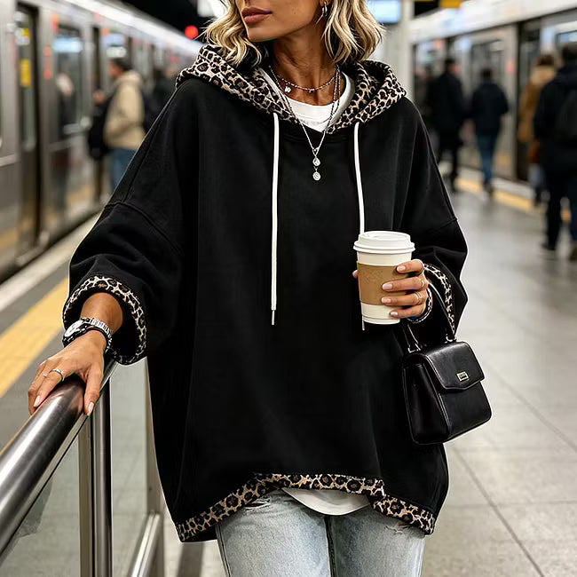 Aliz - Sudadera con capucha, mangas murciélago y ribete de leopardo