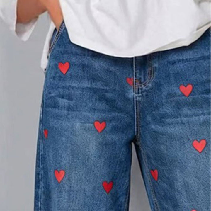 Arabella - Vaqueros de pernera curva con estampado de corazones