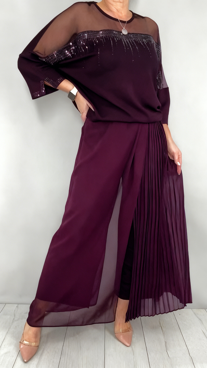 Caia - Conjunto de dos piezas con pantalón con detalles plisados y apliques