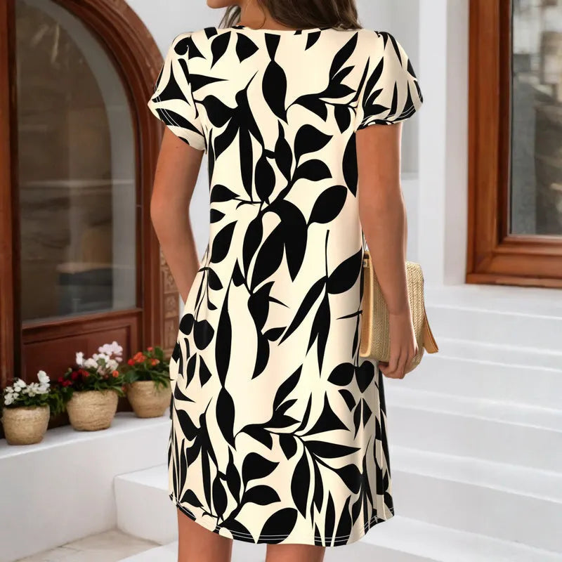 Sapphira - Vestido corto con estampado botánico