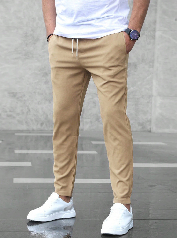 Calix - Pantalón de viaje elástico de alta gama