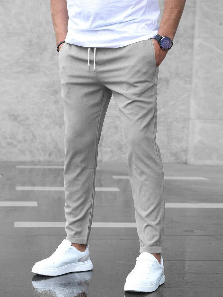 Calix - Pantalón de viaje elástico de alta gama