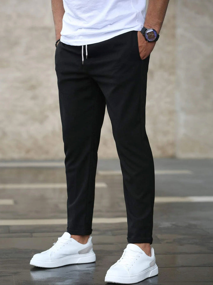 Calix - Pantalón de viaje elástico de alta gama