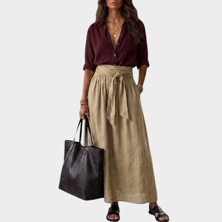 Salome - Conjunto de blusa de corte holgado y falda midi