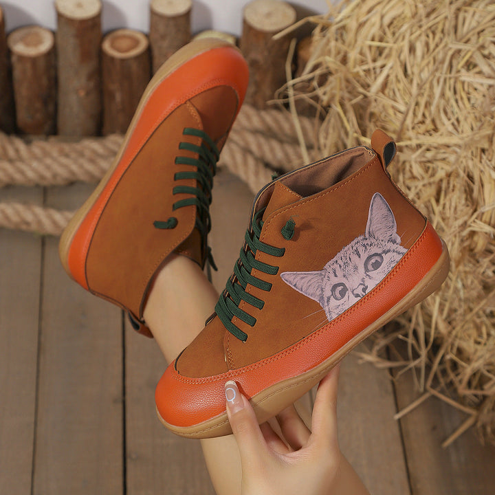 Zorelle - Botines con detalle de gato