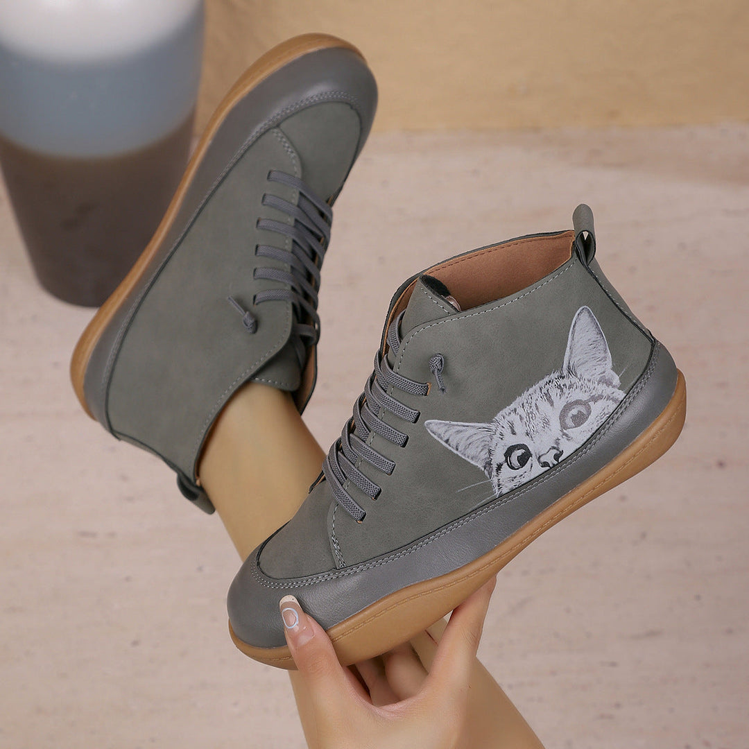 Zorelle - Botines con detalle de gato