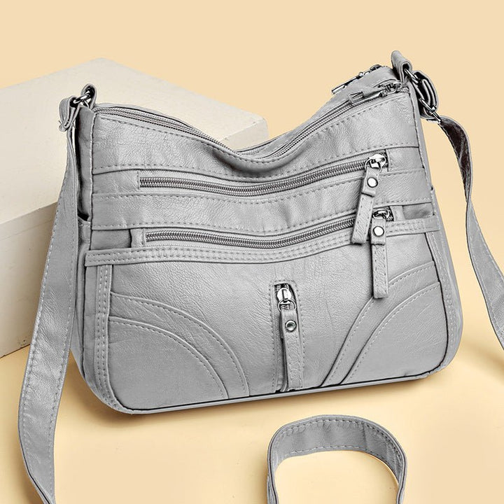 Esme - Bolso bandolera con múltiples compartimentos