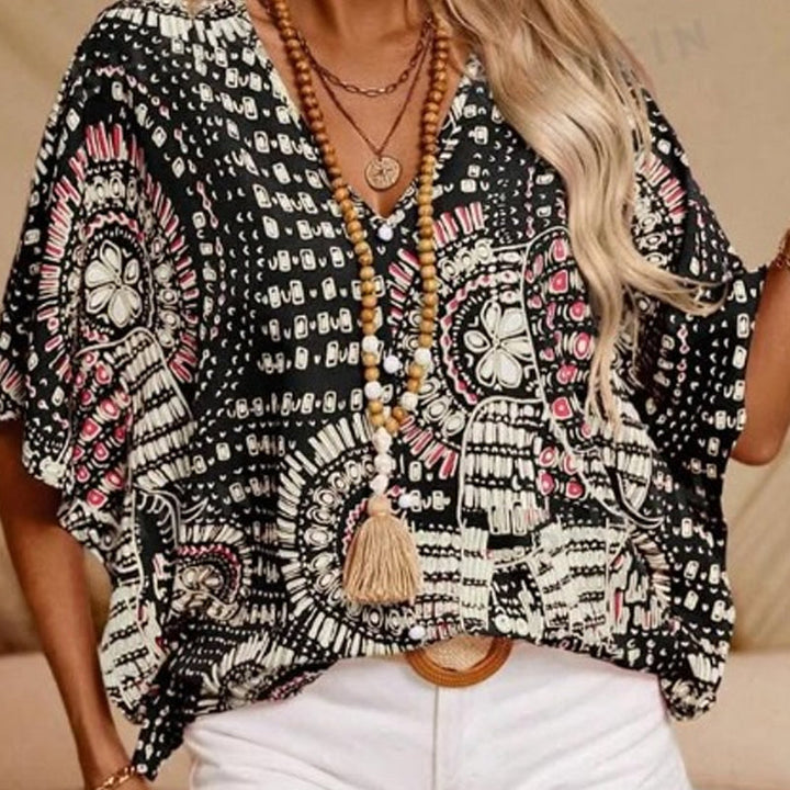 Noellise - Blusa artística de manga murciélago