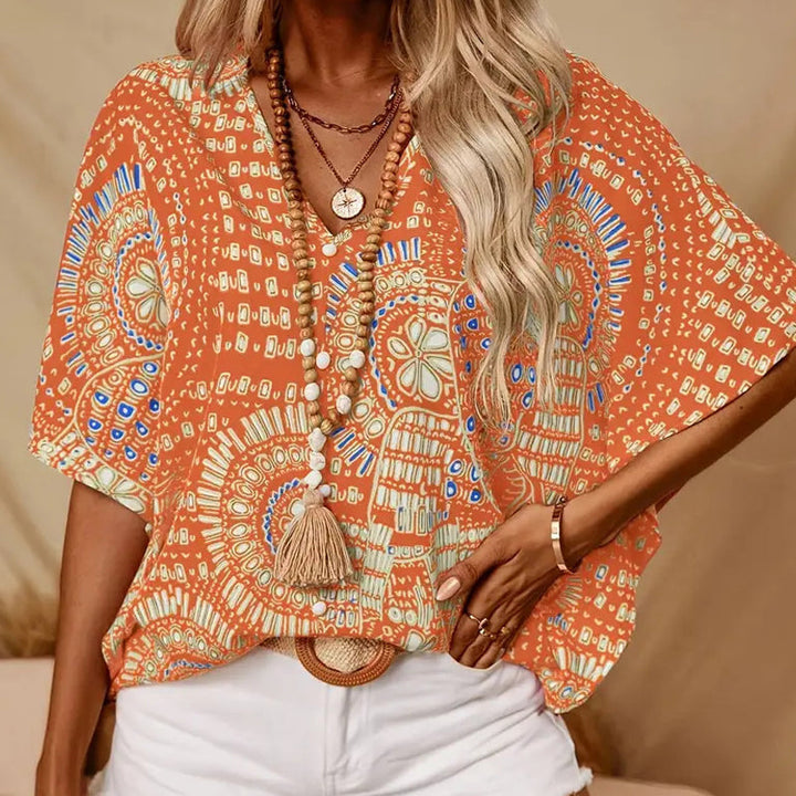 Noellise - Blusa artística de manga murciélago