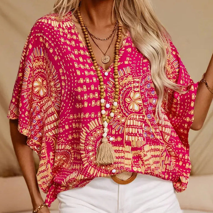Noellise - Blusa artística de manga murciélago