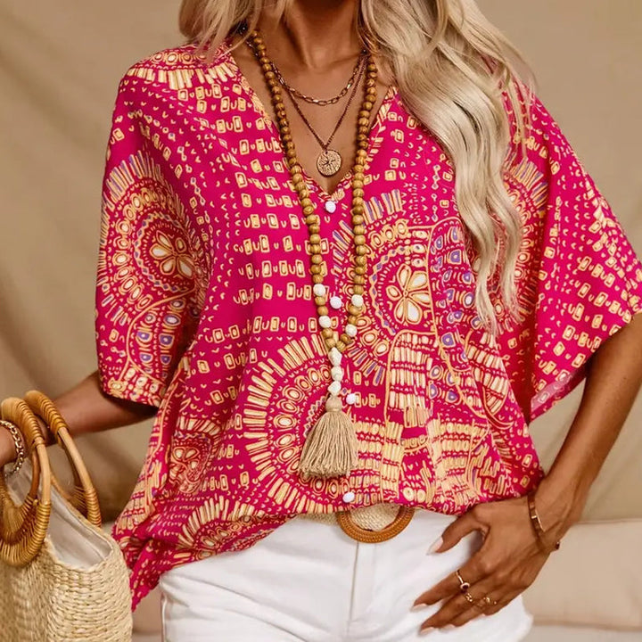 Noellise - Blusa artística de manga murciélago