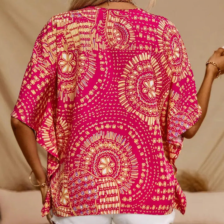 Noellise - Blusa artística de manga murciélago